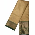 Kanjivaram tissue silk saree with a golden body and a contrasting dark green border and pallu.